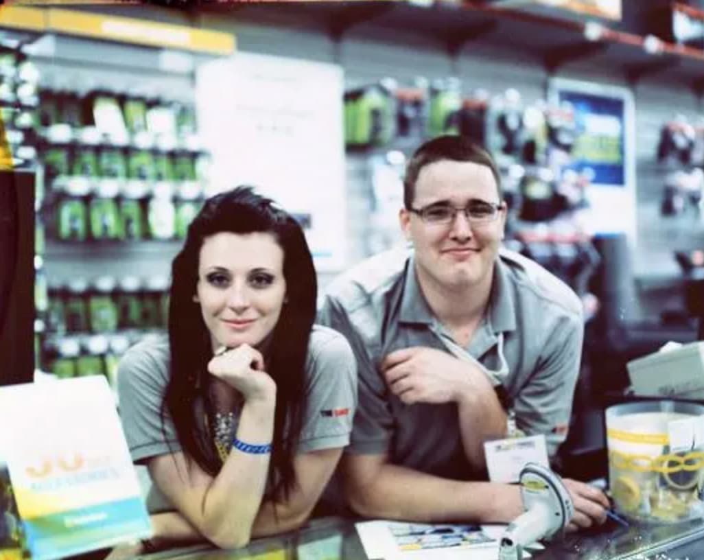 Radio Shack workers in New Jersey smile for the camera. 
